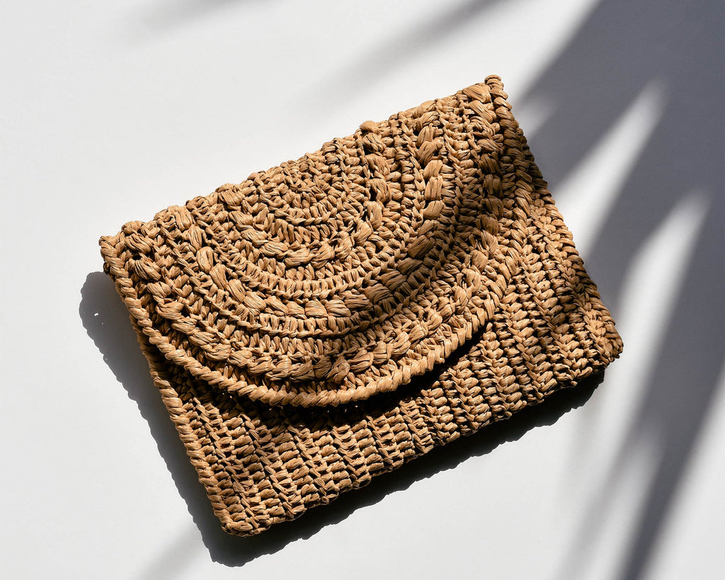 Plexida Knitwear, crochet raffia clutch