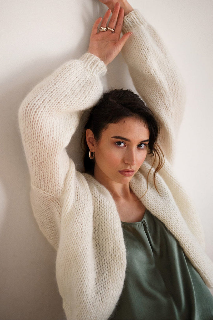 Balloon sleeves of the mohair bomber cardigan in cloud color