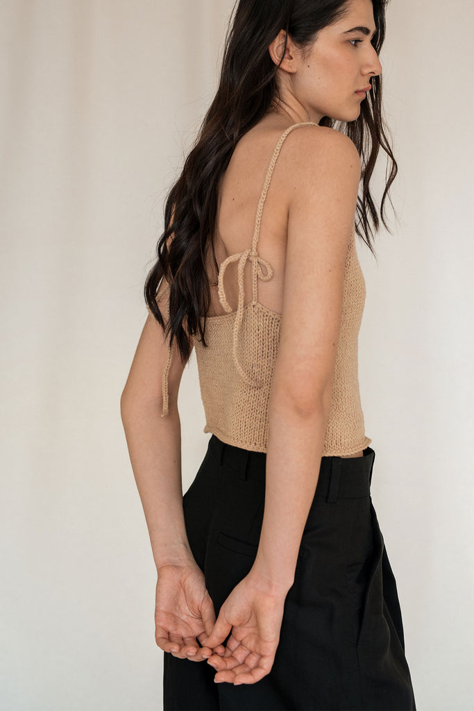 Adjustable straps of the sleek knit top
