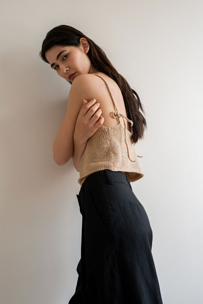 Beige open back knit top