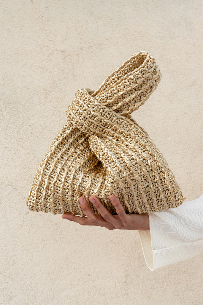 Crochet raffia knot bag in gold