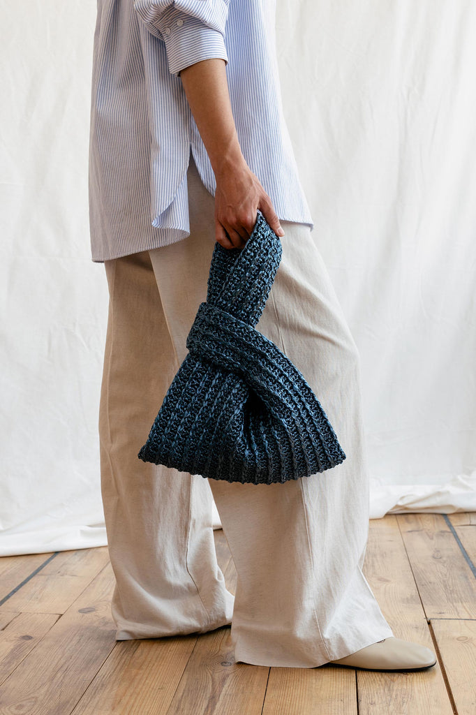 Dark blue handmade crochet handbag
