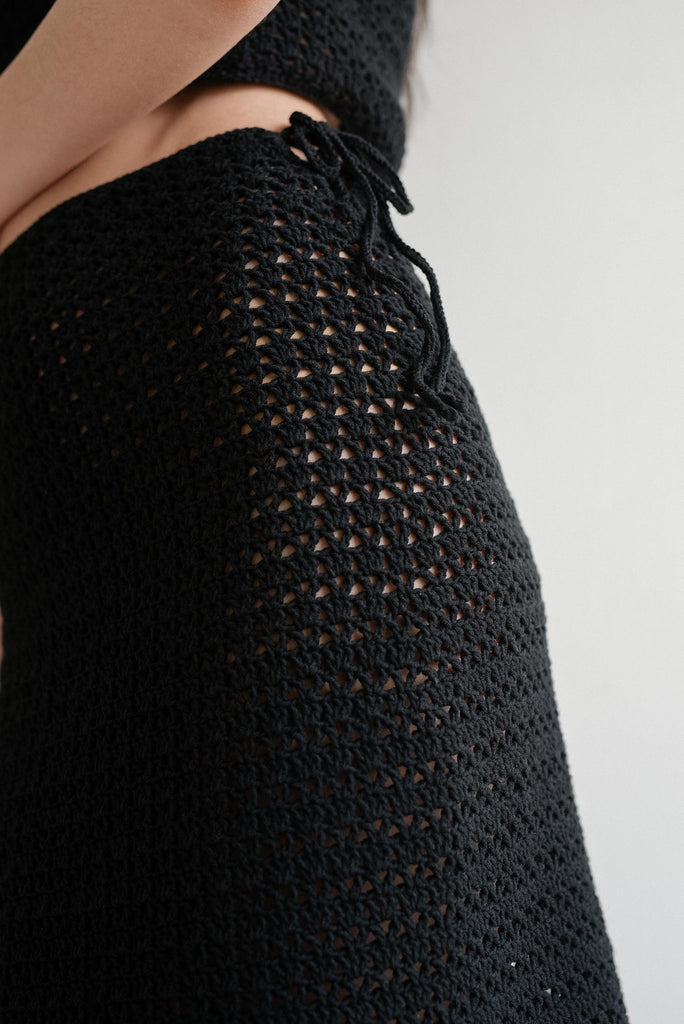 Detail of the ida crochet skirt in black