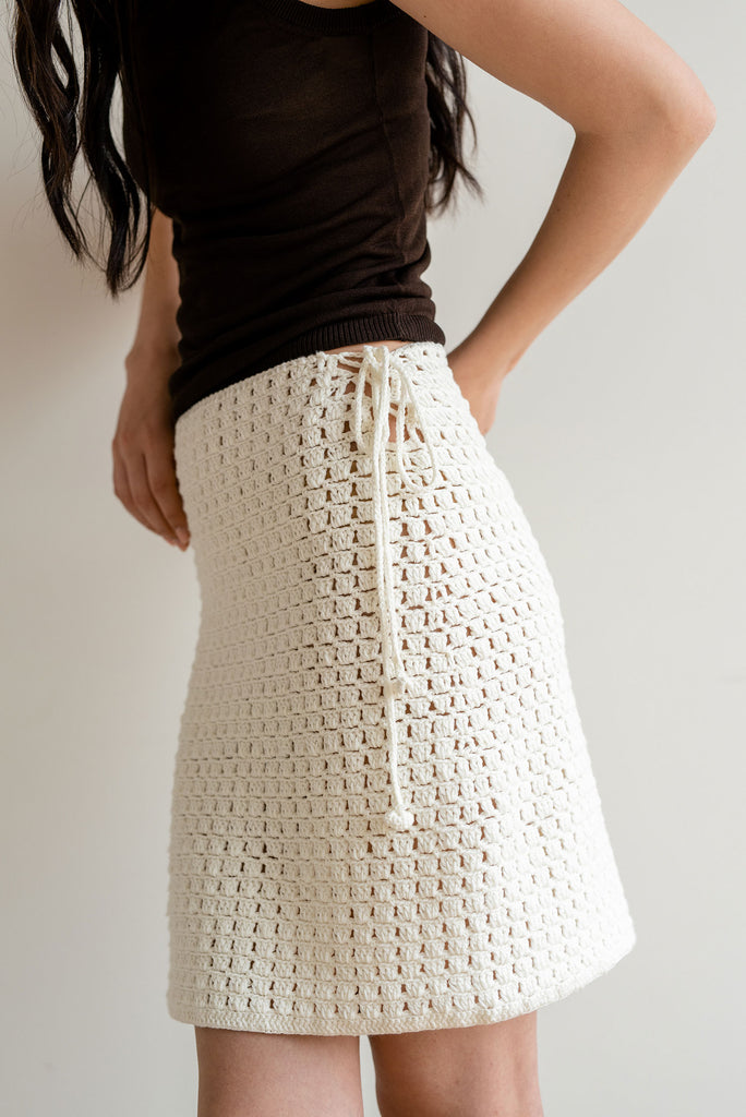 Detail of the ossa crochet skirt in off white