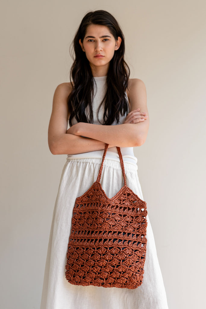 Hand crocheted raffia tote in rust