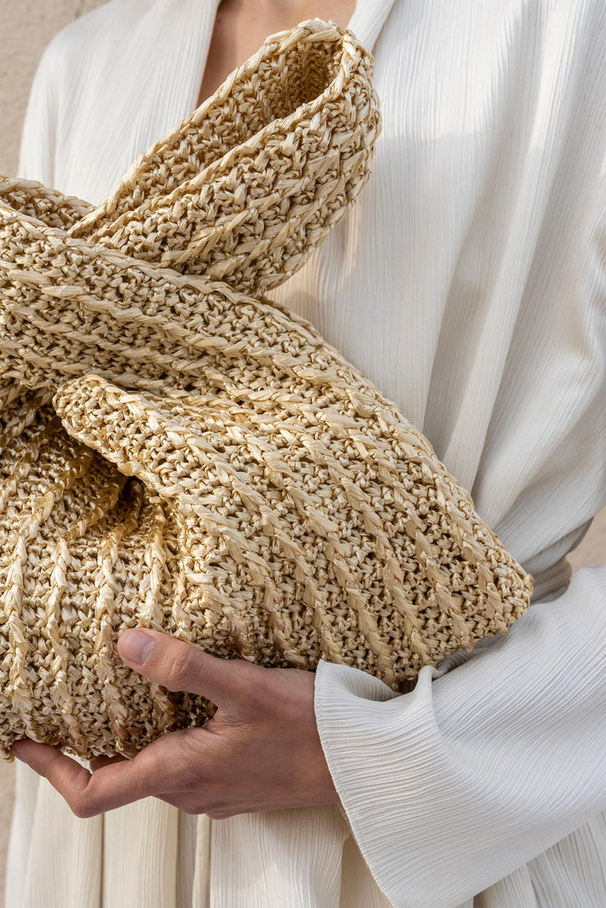 Metallic gold raffia knot bag