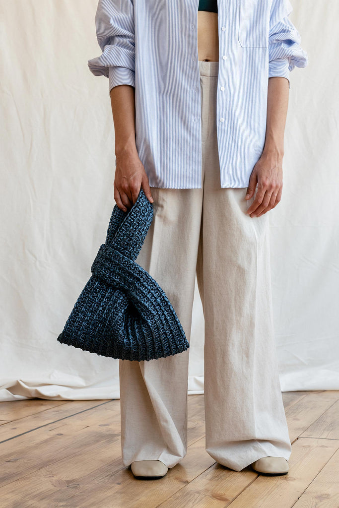Navy blue crochet raffia handbag
