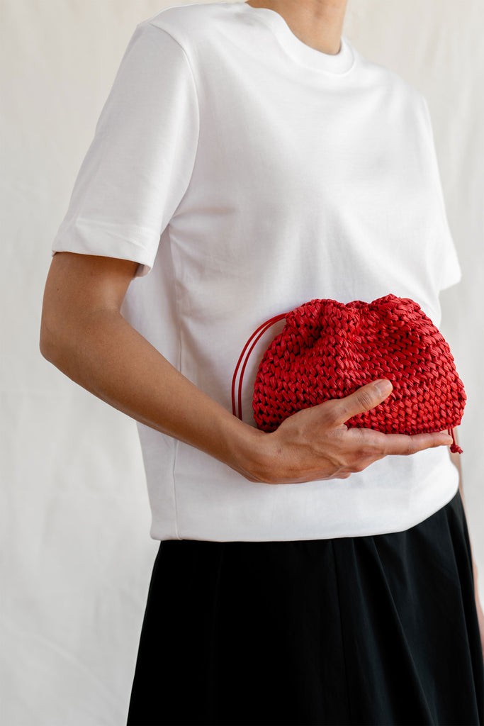 Poppy red crochet raffia clutch