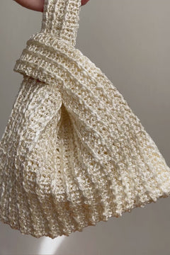 Video detail of the raffia knot bag in seashell