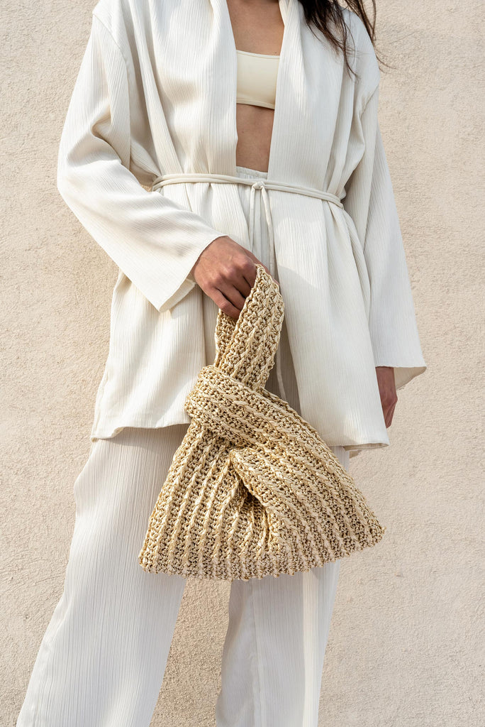 Raffia knot bag in gold