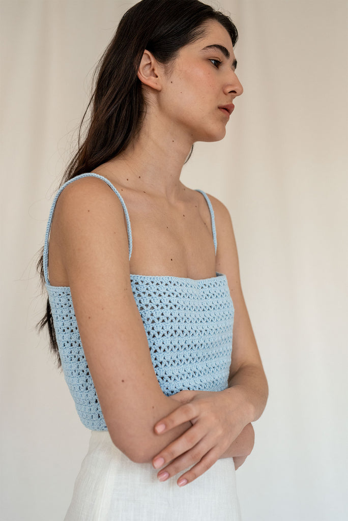Side view of the Ida crochet top in blue
