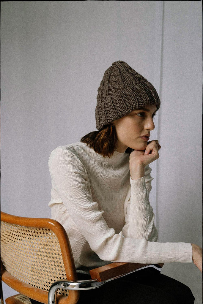 Hand knit hat in brown