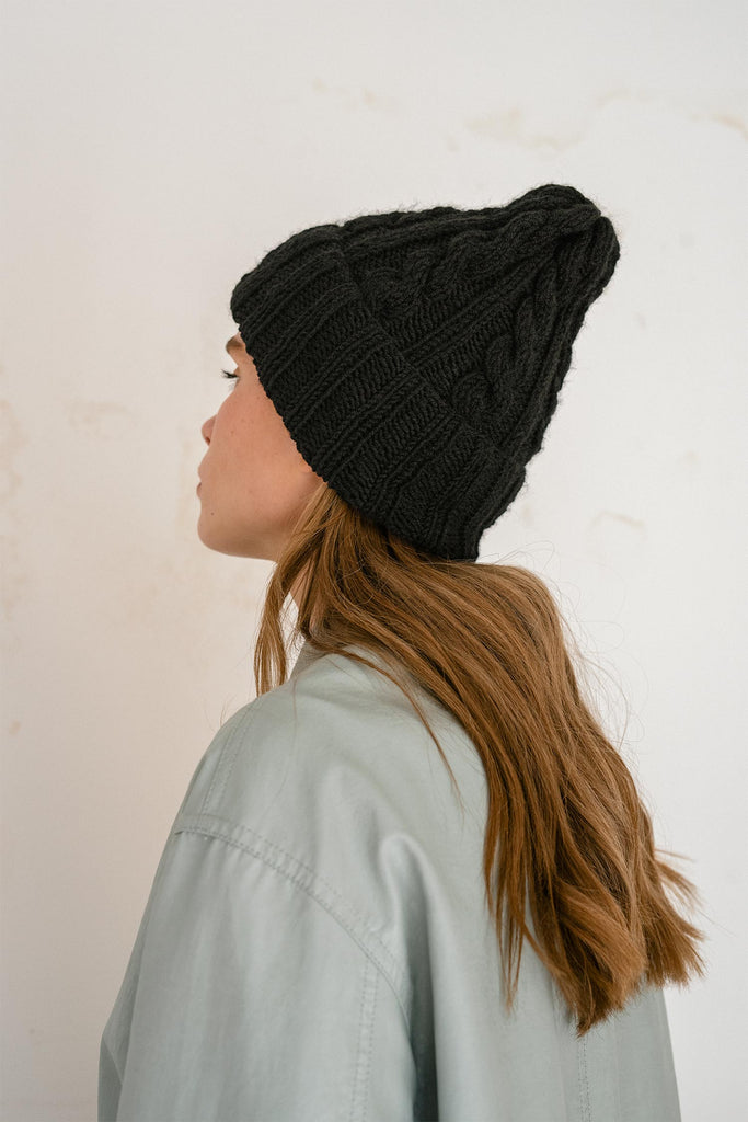 Back of the hand knit wool beanie in black