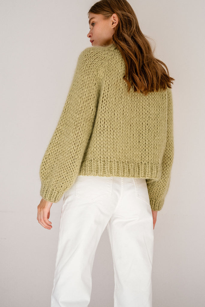 Back of the relaxed mohair sweater in pistachio green