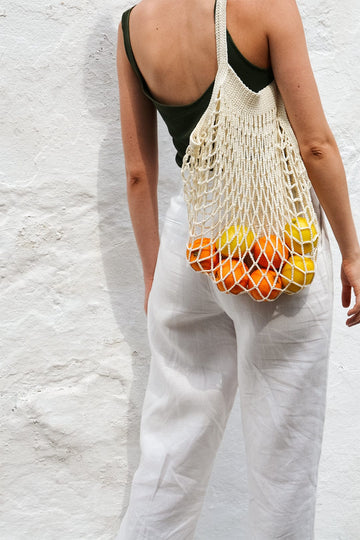 The Crochet Market Bag in Off White on model