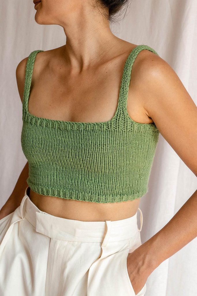 Detail of the square neck crop top in olive green