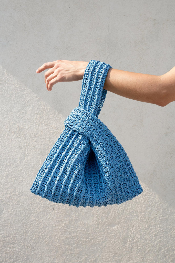 Detail of the raffia knot bag in ocean blue