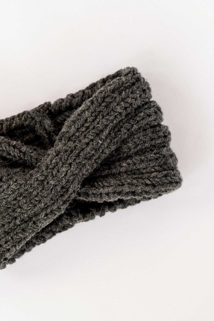 Detail of the turban in dark grey