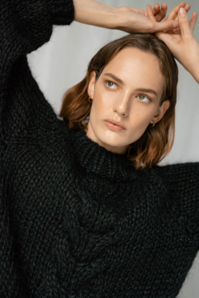 Front detail of the chunky braid sweater in night