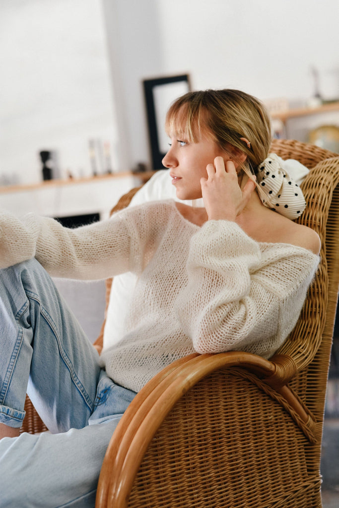 Hand knit deep v sweater in cloud