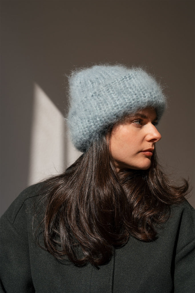 Hand knit winter hat in light blue