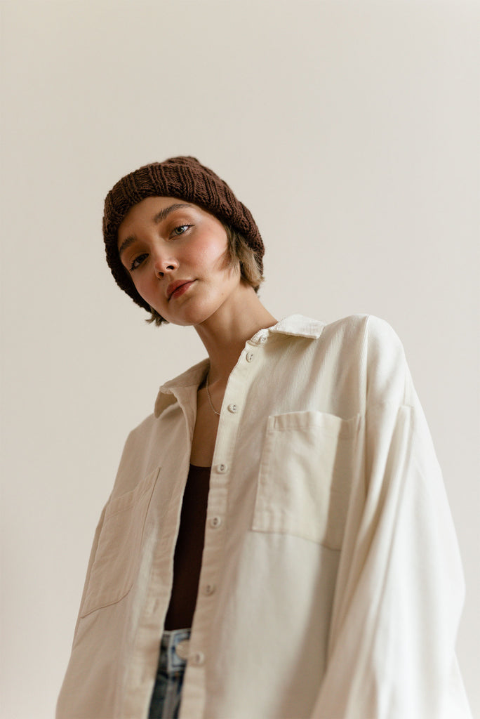 Hand knit wool hat in brown