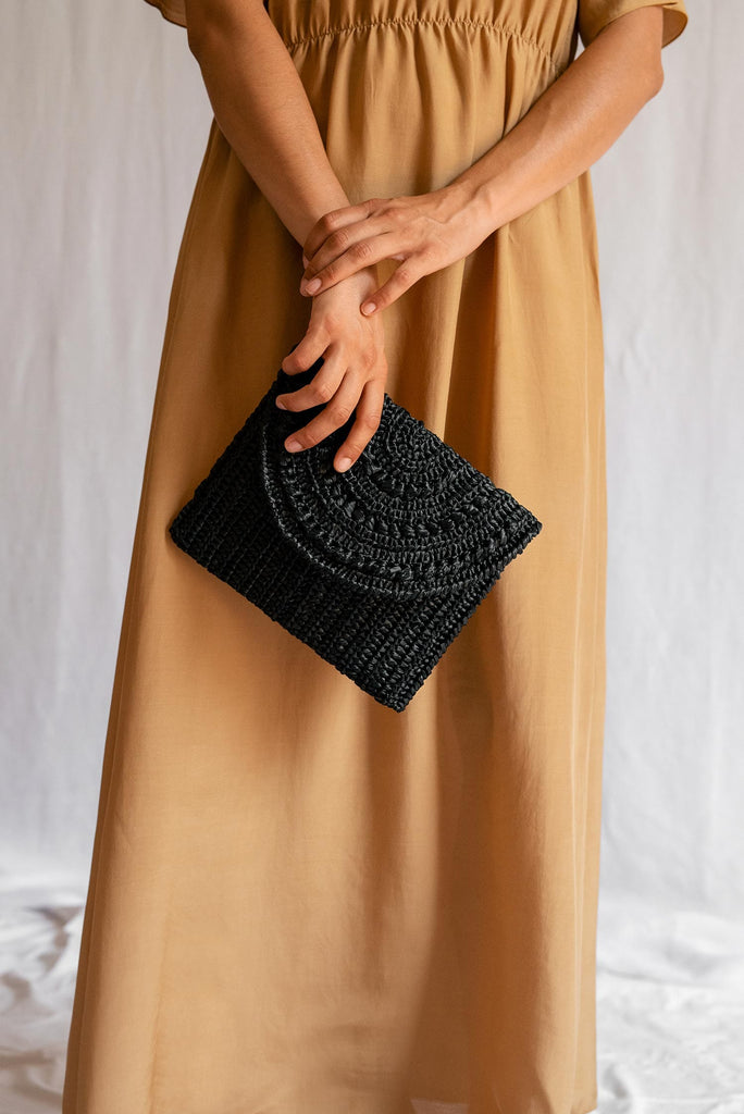 Marigold clutch in black raffia