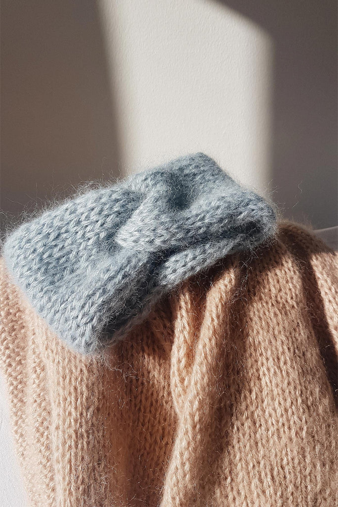 Detail of the mohair turban in ozone 