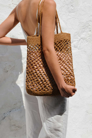 Crochet raffia tote bag on model