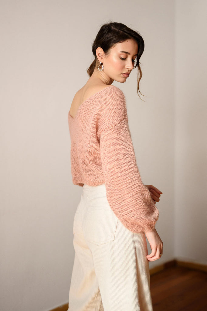 Side view of the mohair deep v sweater in petal 